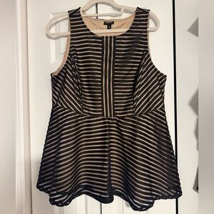 Stunning black and nude peplum tank.  Like new!